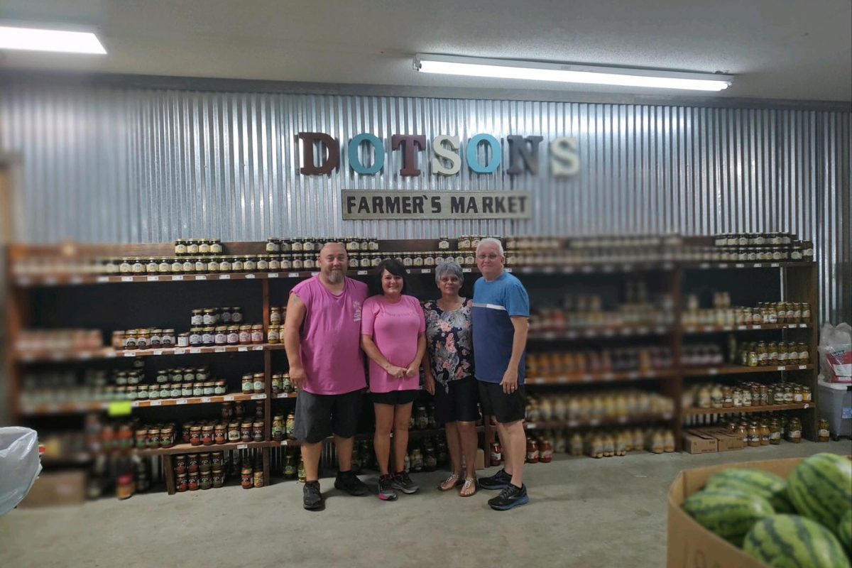 Dotson’s Produce and Greenhouse – Explore the Picturesque Hanging Flower Baskets That Brighten up the Market.